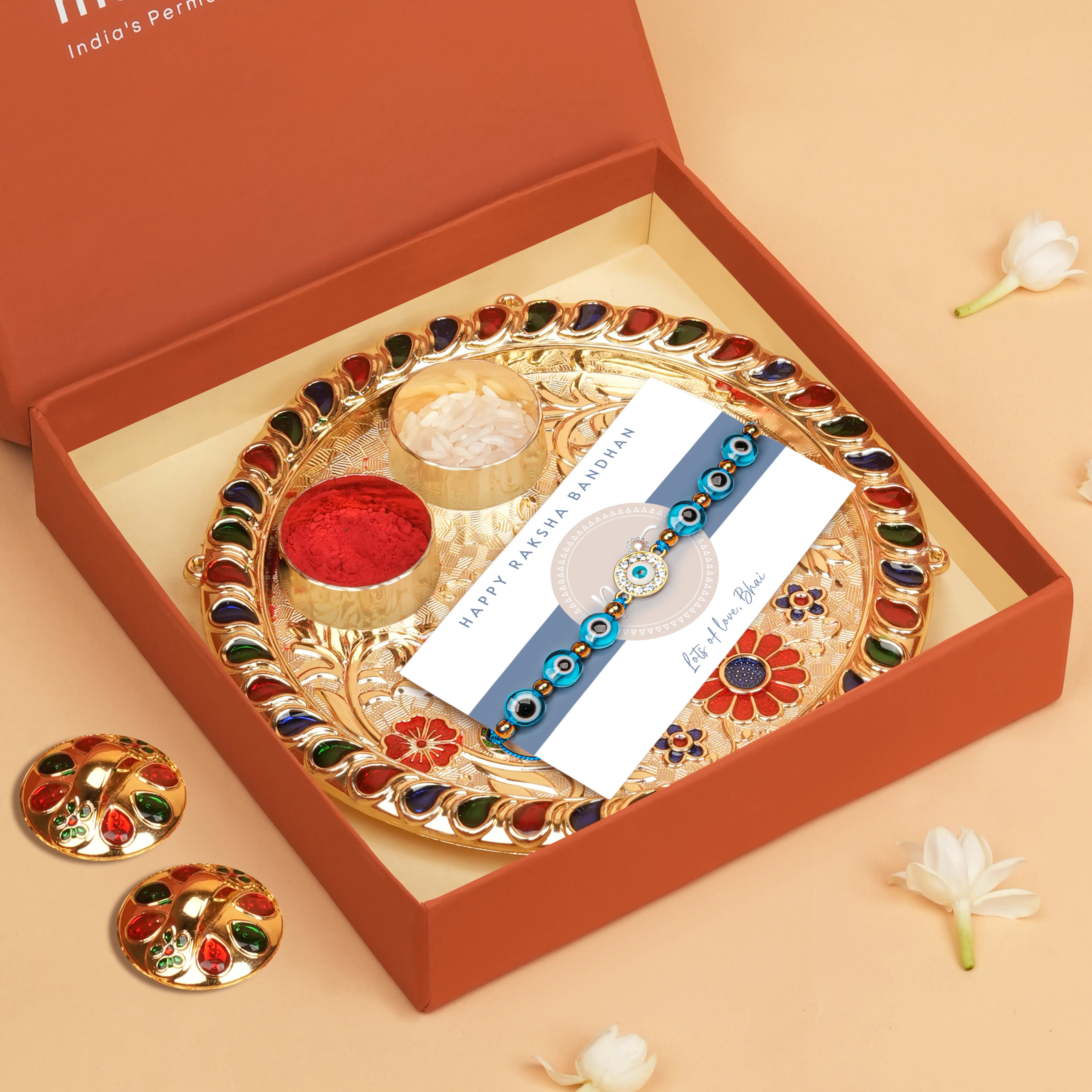 Handcrafted Drishti Kavach Studded Rakhi With Roli Chawal Thali