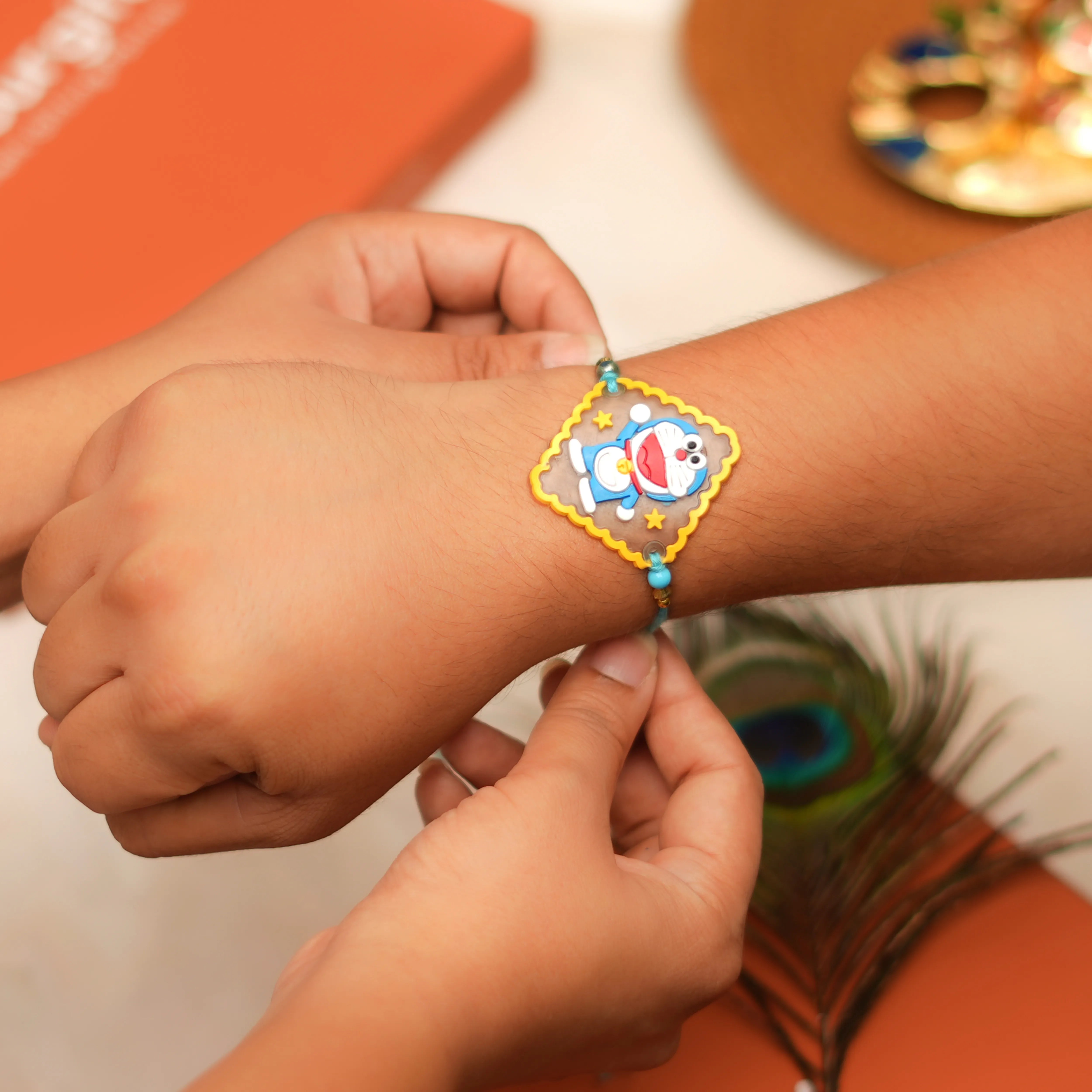 Handcrafted Doraemon Kids Rakhi With Roli Chawal Thali