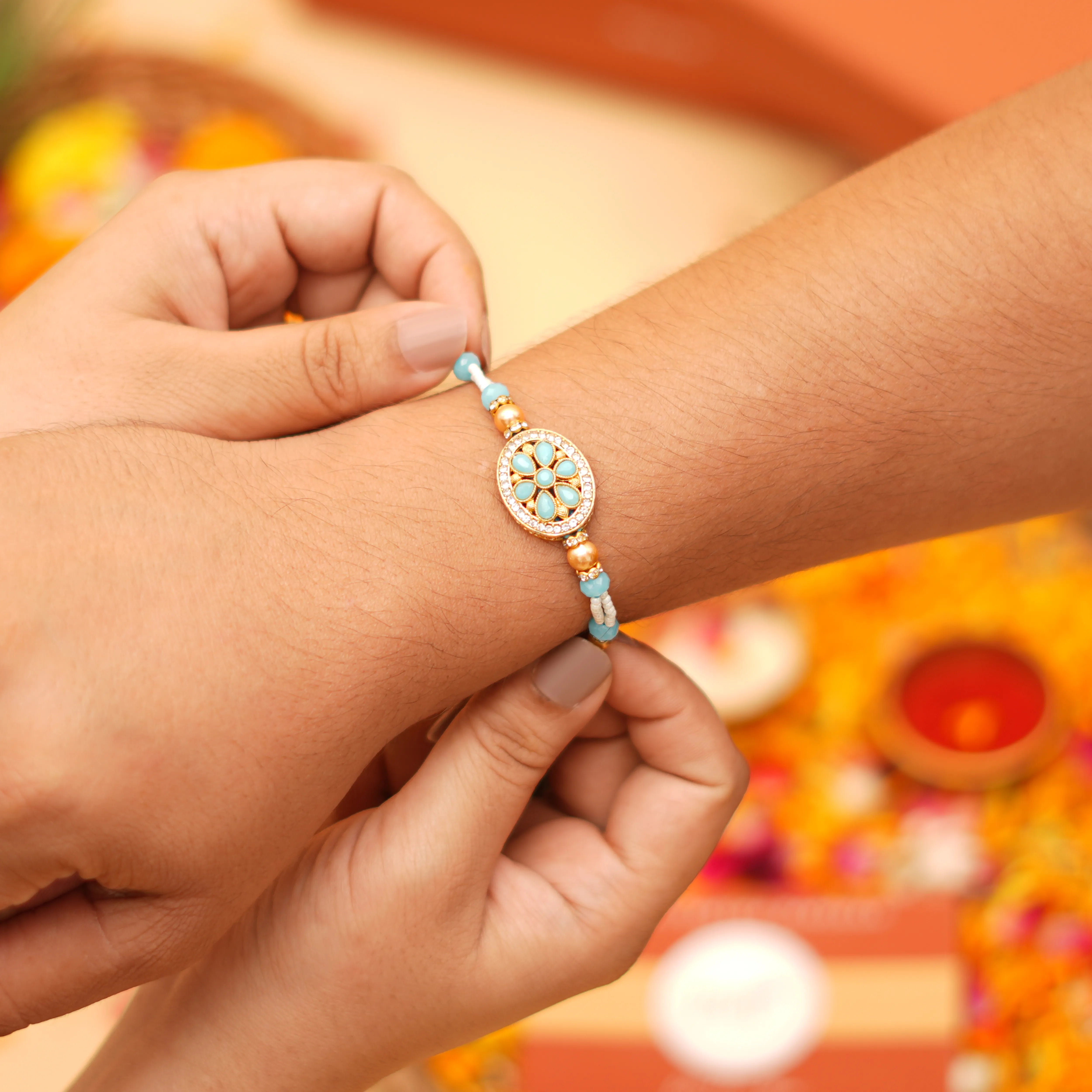 Handcrafted Shubh Neel Pushp Beads Rakhi With Roli Chawal Thali