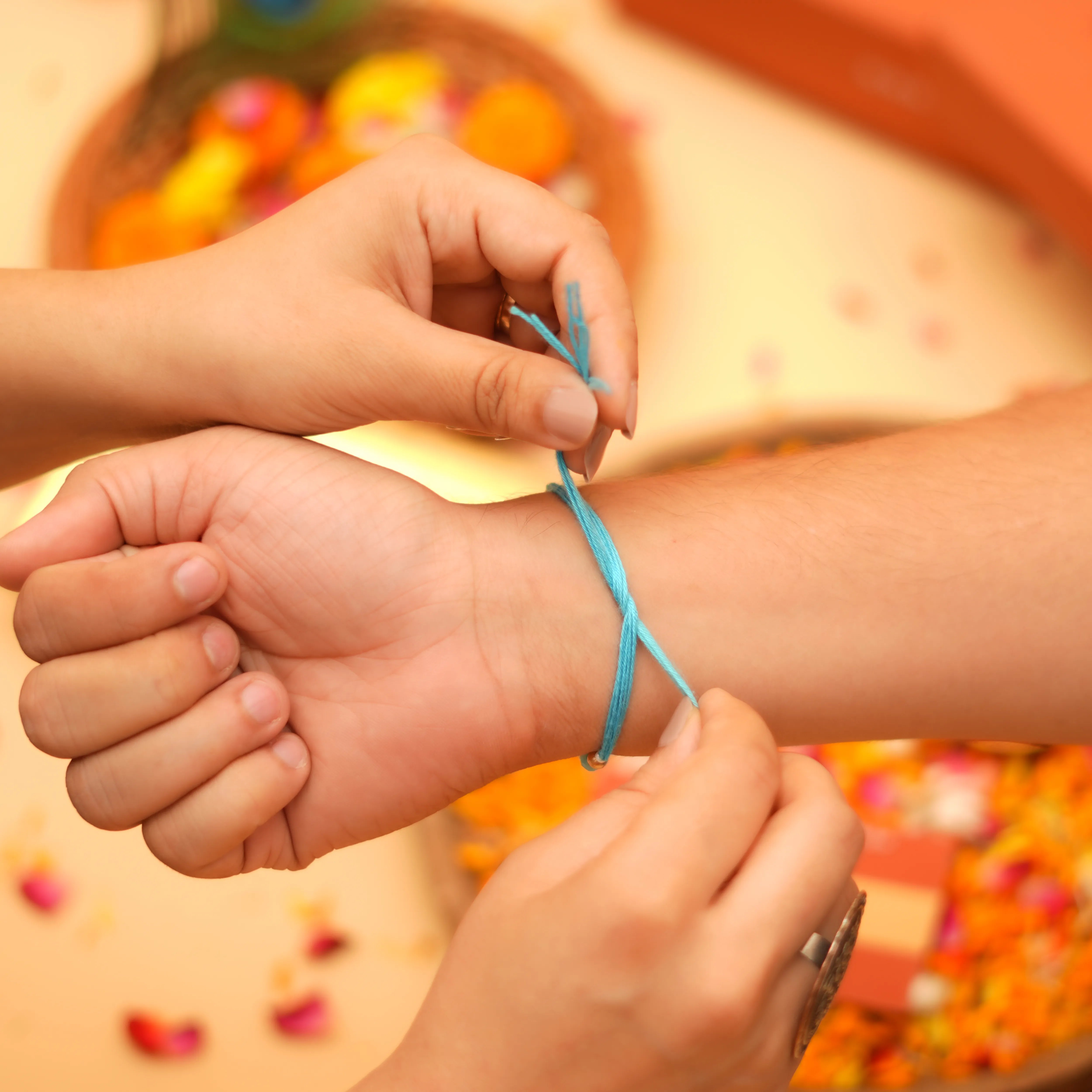 Handcrafted Shubh Neel Pushp Beads Rakhi With Roli Chawal Thali