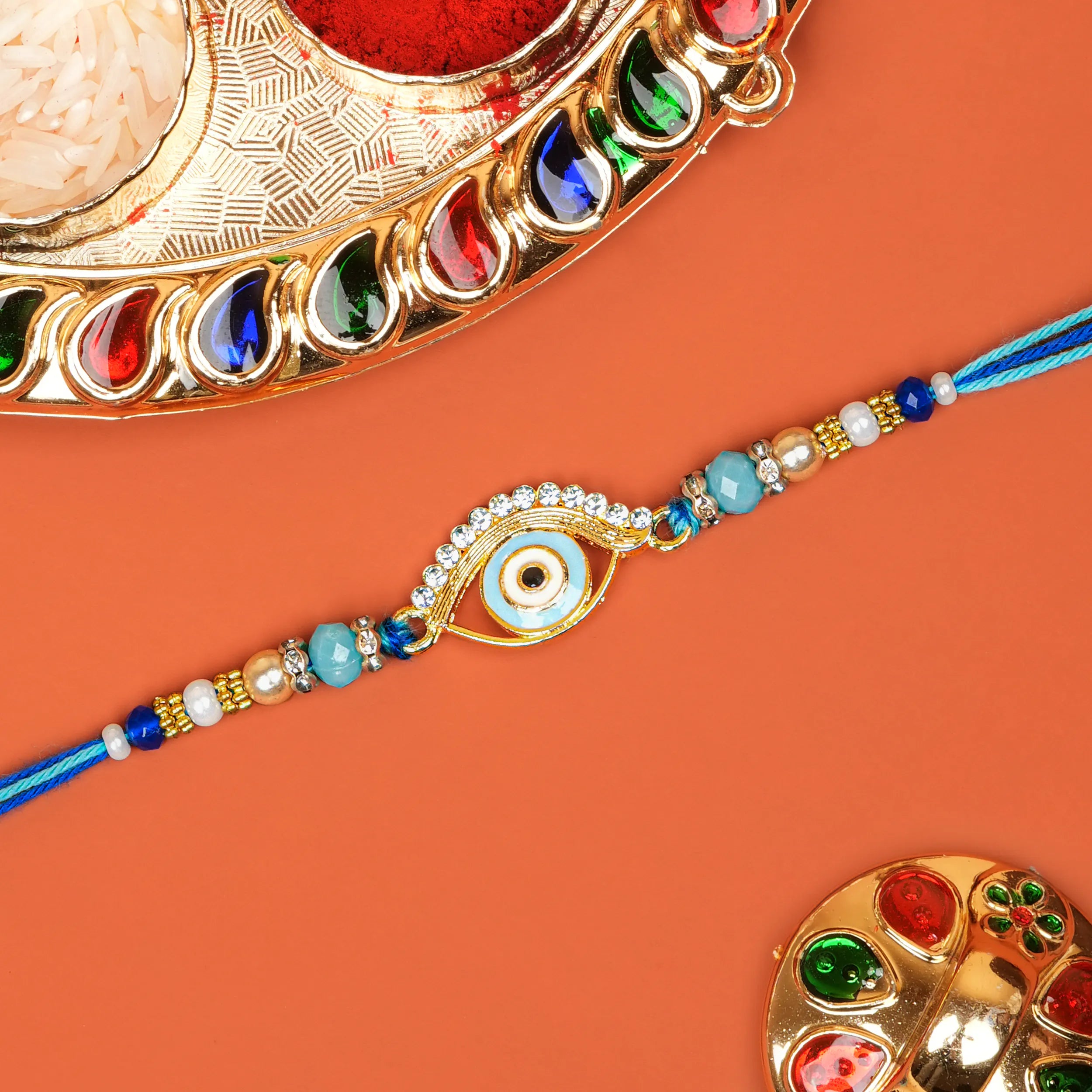 Handcrafted Teardrop Evil Eye Beaded Designer Rakhi With Roli Chawal Thali
