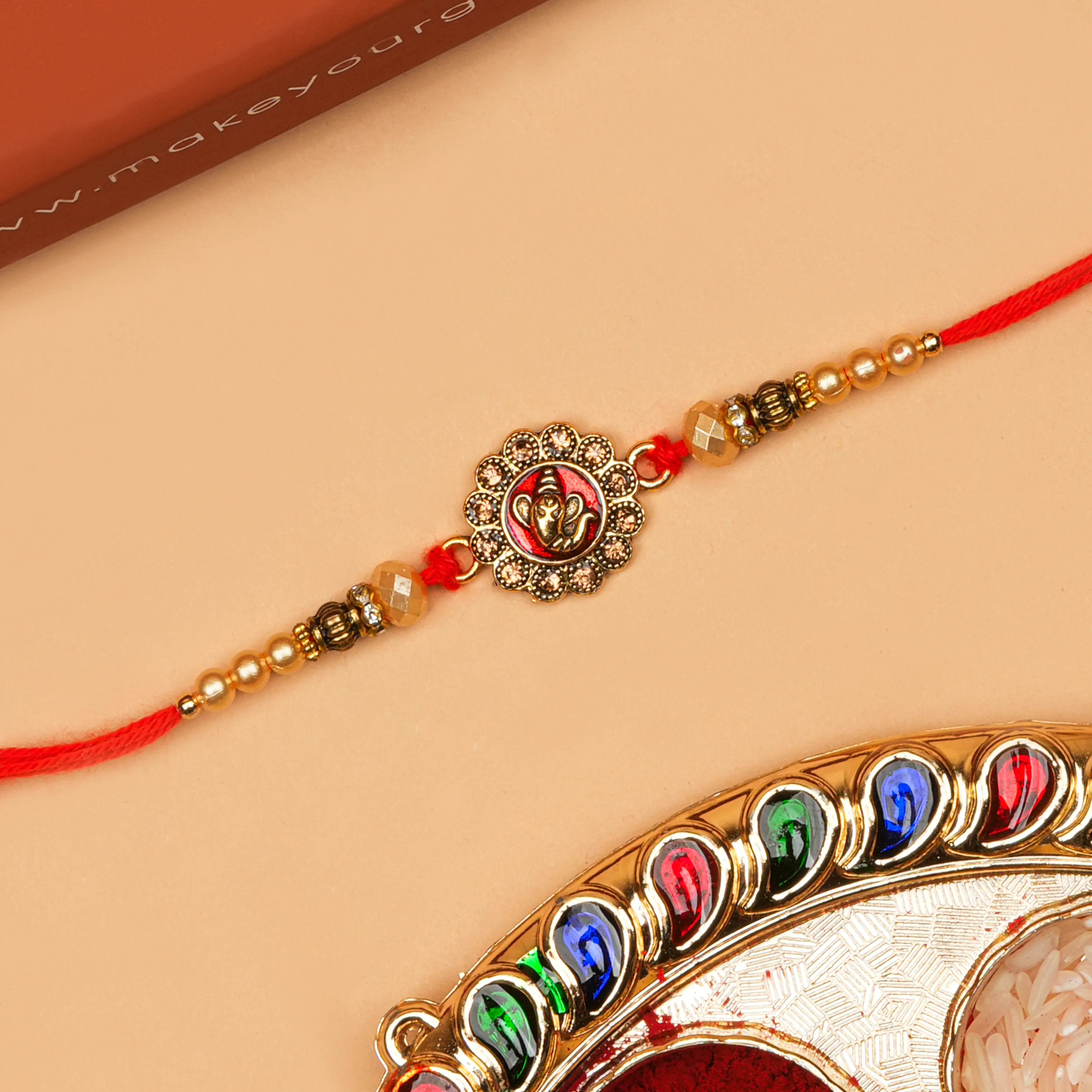 Handcrafted Ganpati Shubh Labh Rakhi With Roli Chawal Thali