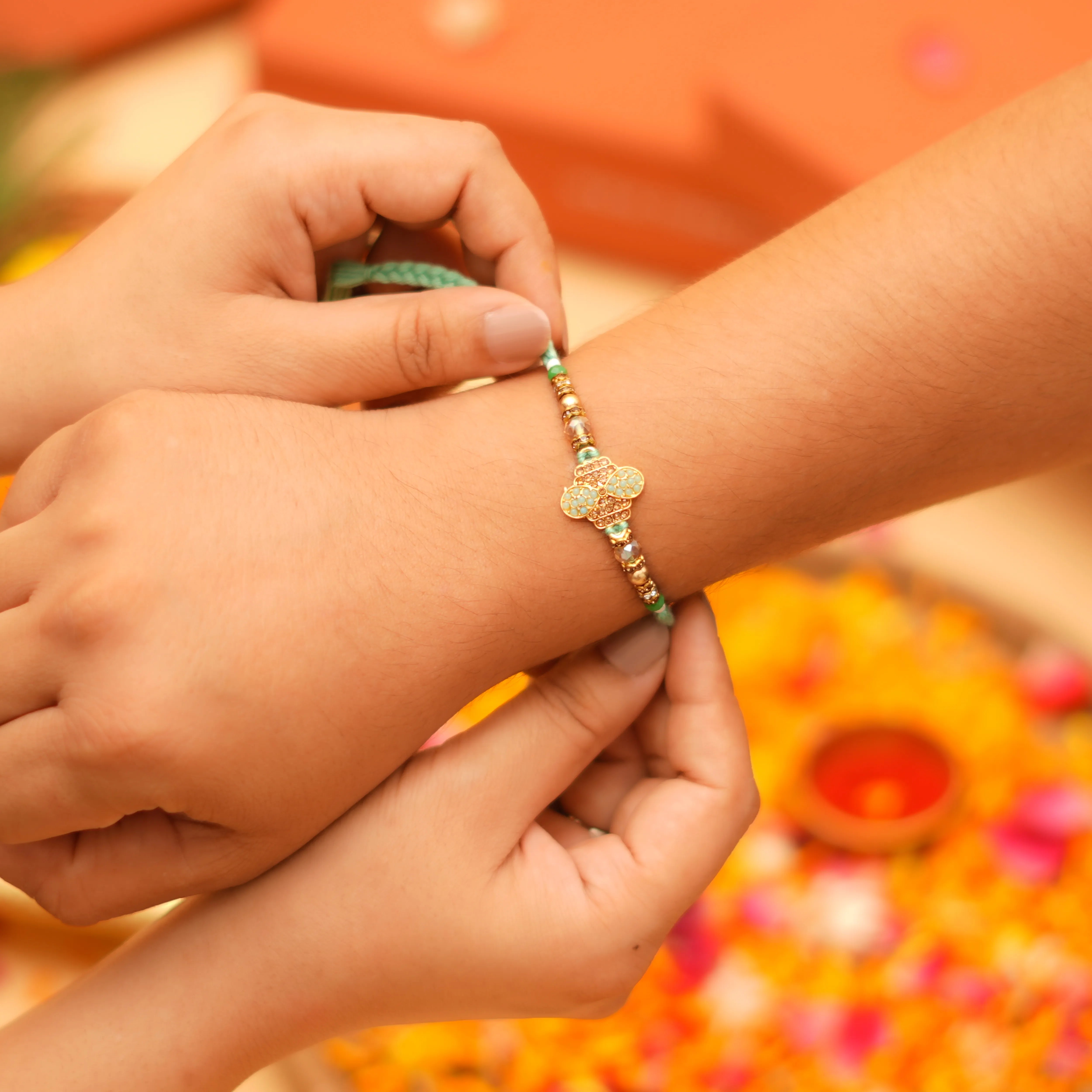 Handcrafted Pushp Vayu Beads Rakhi With Roli Chawal Thali