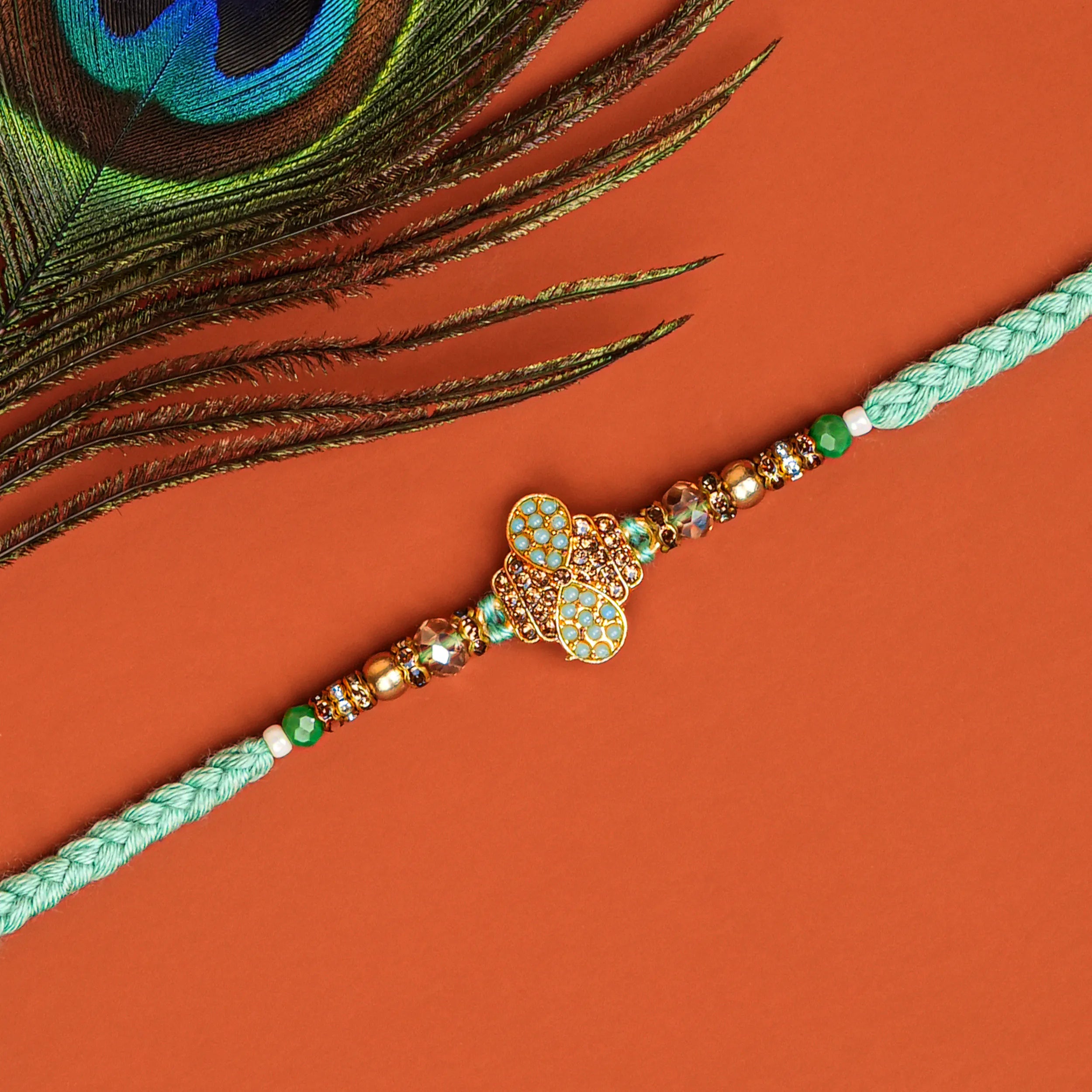Handcrafted Pushp Vayu Beads Rakhi With Roli Chawal Thali