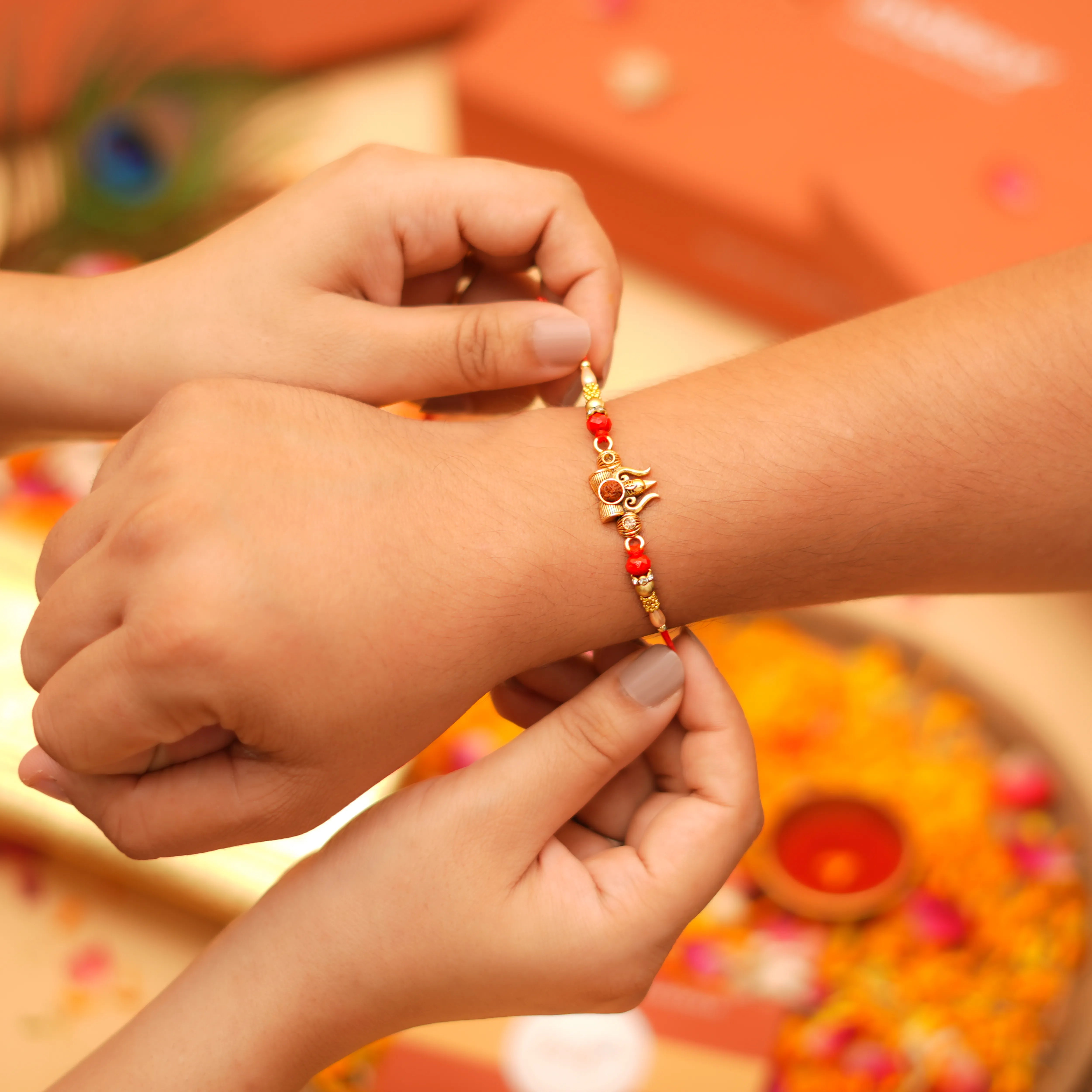 Handcrafted Trishul With Rudraksh Beads Rakhi With Roli Chawal Thali