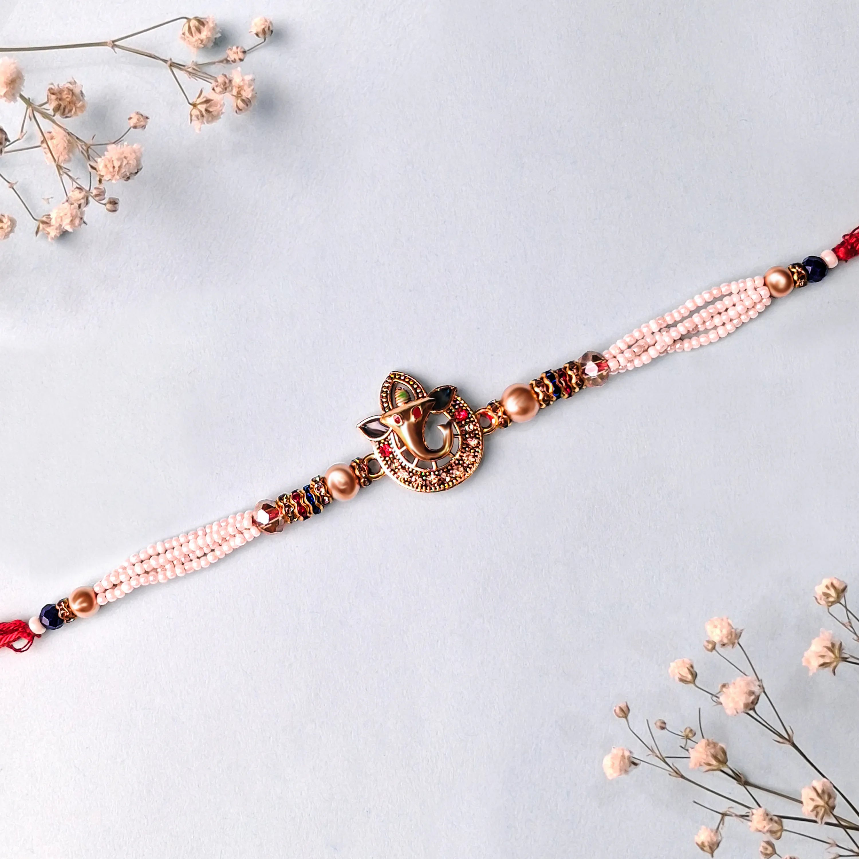Handcrafted Sri Ganesh Pearl Bead Rakhi